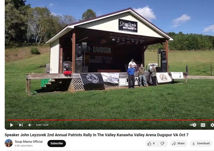 <em>Bob Herget stands next to John Leyzorek at the October 2023 Patriots in the Valley rally in Southwest Virginia (Screenshot of public YouTube video)</em>