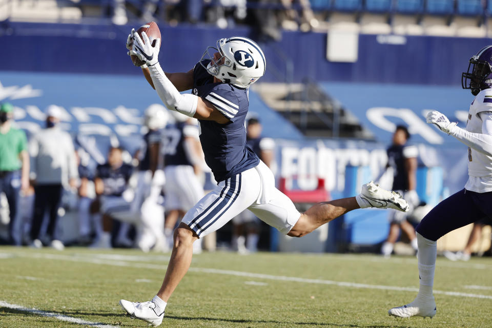 BYU wide receiver Dax Milne makes a reception for a first down in the second quarter against North Alabama during an NCAA college football game Saturday, Nov. 21, 2020, in Provo, Utah. (AP Photo/Jeff Swinger, Pool)