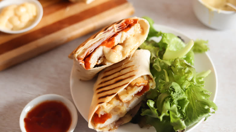 french tacos with lettuce on white plate