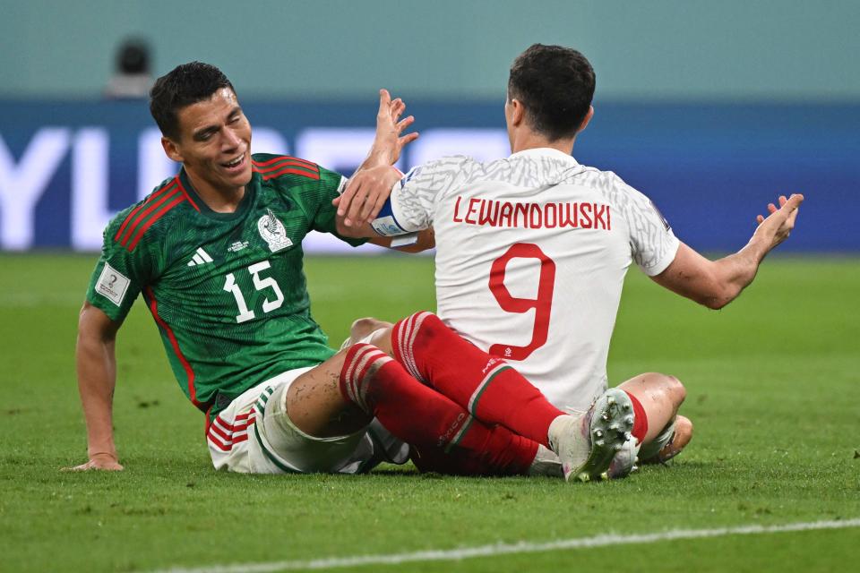 Hector Moreno gave away a penalty with a challenge on Robert Lewandowski (AFP via Getty Images)