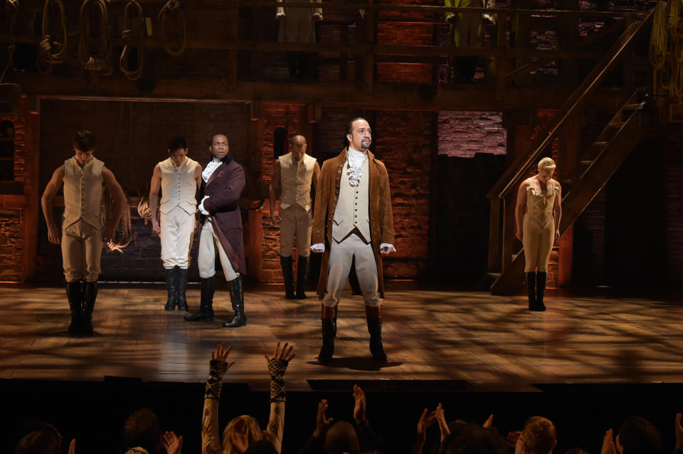 NEW YORK, NY - FEBRUARY 15:  Actor Leslie Odom, Jr. (L)  and actor, composer Lin-Manuel Miranda (R) perform on stage during 'Hamilton' GRAMMY performance for The 58th GRAMMY Awards at Richard Rodgers Theater on February 15, 2016 in New York City.  (Photo by Theo Wargo/Getty Images)