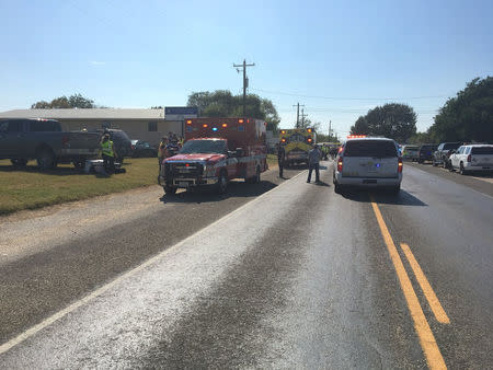 A police car and a medical vehicle are seen near the First Baptist Church in Sutherland Springs, U.S., November 5, 2017, in this picture obtained via social media. MAX MASSEY/ KSAT 12/via REUTERS