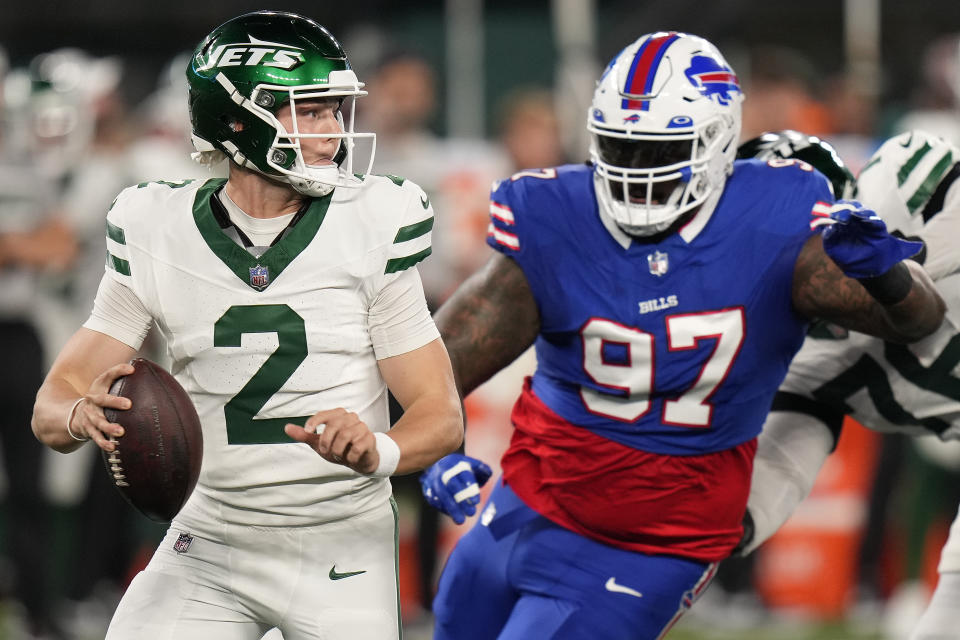 Buffalo Bills defensive tackle Jordan Phillips (97) puts pressure on New York Jets quarterback Zach Wilson (2) during the second quarter of an NFL football game, Monday, Sept. 11, 2023, in East Rutherford, N.J. (AP Photo/Seth Wenig)