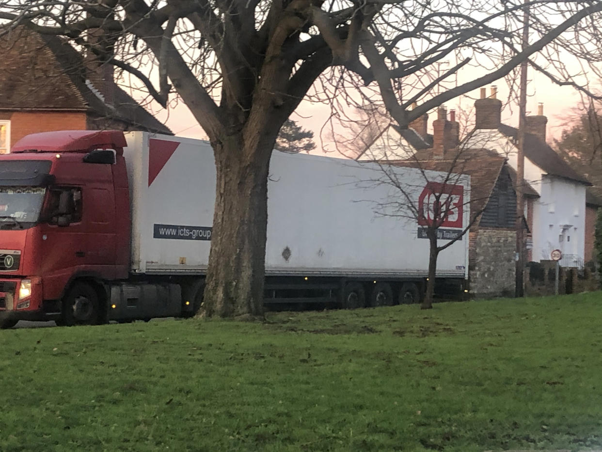 Lorries in the small village of Mersham near Ashford, Kent. See SWNS copy NNvillage: Lost truckers are clogging up a small village because the government is giving them the wrong postcode for their new Brexit lorry park. Frustrated residents living in Mersham near Ashford, Kent, have seen their narrow country lanes blocked by HGVs that have been given incorrect directions. Around 30 lorries arrived in the village since the 66-acre lorry park opened for coronavirus testing on Monday.