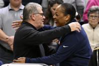 UConn head coach Geno Auriemma, left, and Syracuse head coach Felisha Legette-Jack embrace before a second-round college basketball game in the NCAA Tournament, Monday, March 25, 2024, in Storrs, Conn. (AP Photo/Jessica Hill)