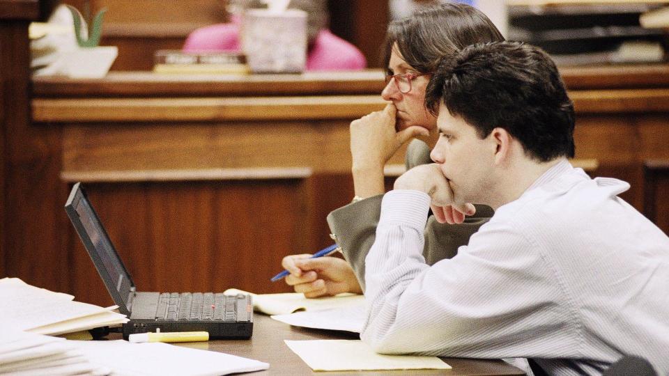 Lyle Menendez and his attorney, Terri Towery, during the retrial for Menendez and his brother, Erik, on Oct. 12, 1995. He did not testify. / Credit: AP Photo