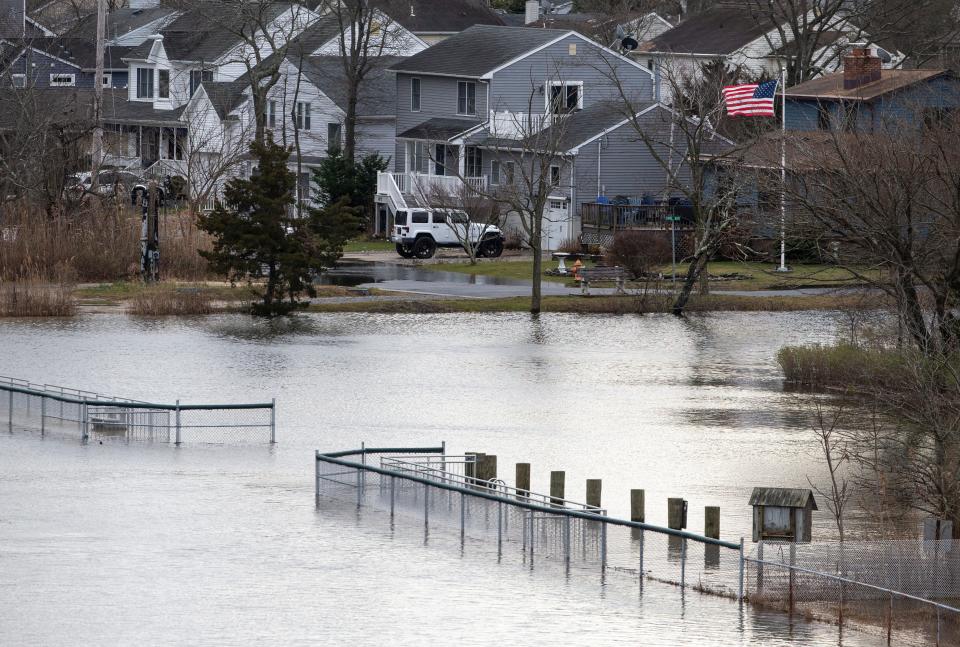 The Point Pleasant Canal begins to flood areas along the waterfront in New Jersey on Jan. 10, 2024.