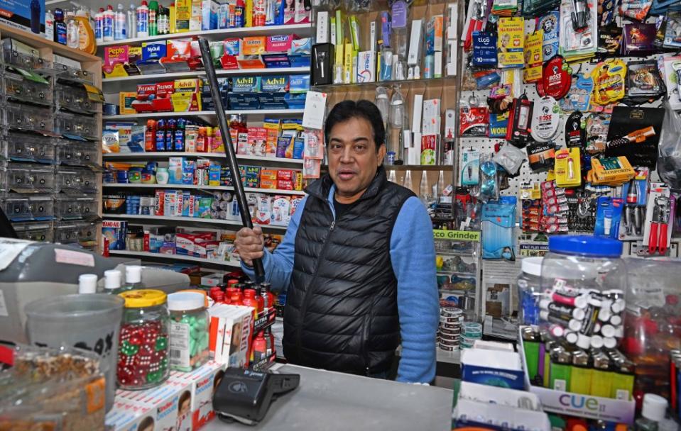 Babu Davnath, who owns 1068 Mini Mart Deli in Greenpoint, has a metal rod he uses to fend off local menace Christopher Boissard, 33, who has harassed locals in the neighborhood for the past 10 years. Gregory P. Mango for NY Post