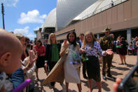 Britain's Meghan, Duchess of Sussex, greets the crowd at the Sydney Opera House in central Sydney, Australia, October 16, 2018. REUTERS/Steven Saphore