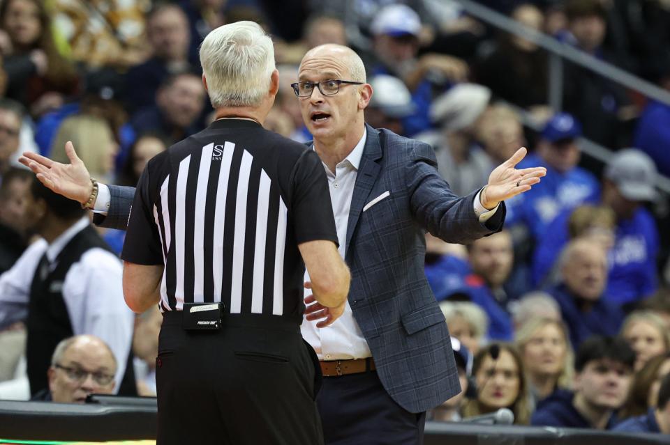 Dec 20, 2023; Newark, New Jersey, USA; Connecticut Huskies head coach Dan Hurley talks with an official during the first half against the Seton Hall Pirates at Prudential Center. Mandatory Credit: Vincent Carchietta-USA TODAY Sports