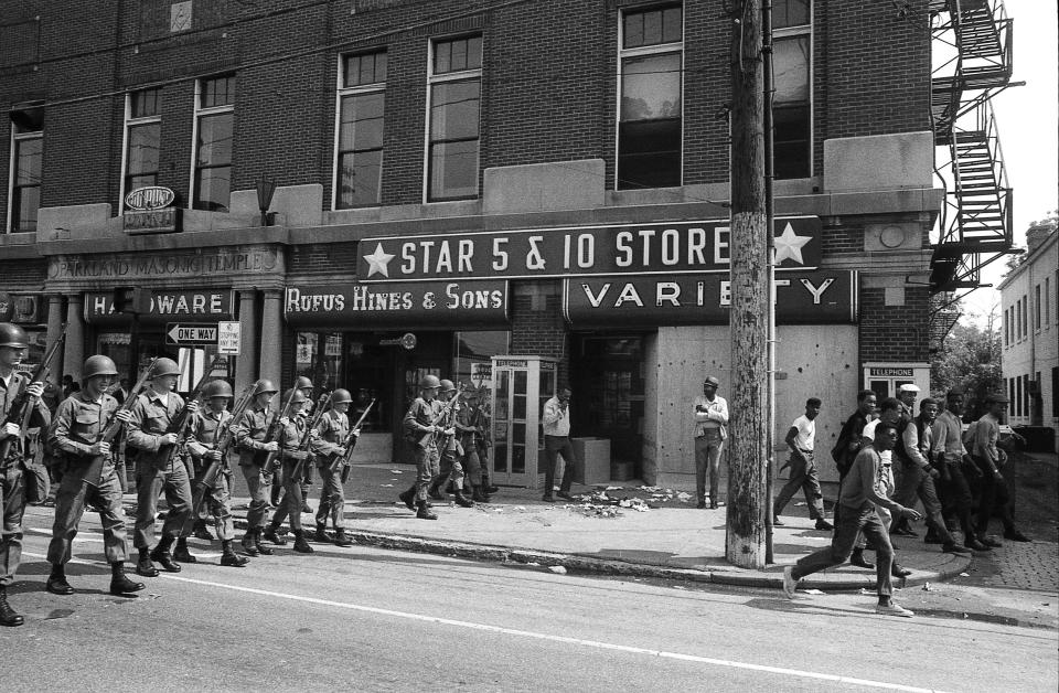 National Guard troops patroled the streets of Louisville's Parkland neighborhood on May 27, 1968 after nights of rioting over civil rights issues.