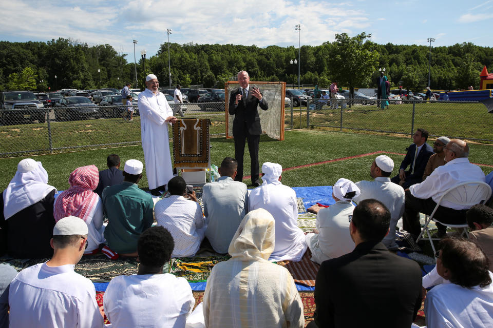 A Muslim congregation attending Eid al-Fitr prayers and celebrations are addressed by Phil Murphy, a gubernatorial candidate, at a park in South Brunswick Township, New Jersey, U.S., on June 25, 2017.&nbsp;