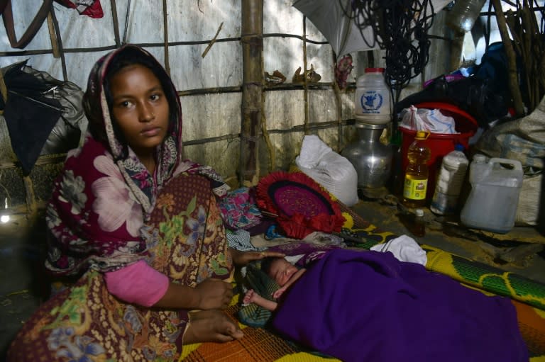 Rohingya woman Hasina Aktar and her newborn baby Mohammed Jubayed Aktar face a life-and-death struggle in the wave of more than 530,000 Rohingya Muslims who have fled ethnic strife in Myanmar in the past eight weeks