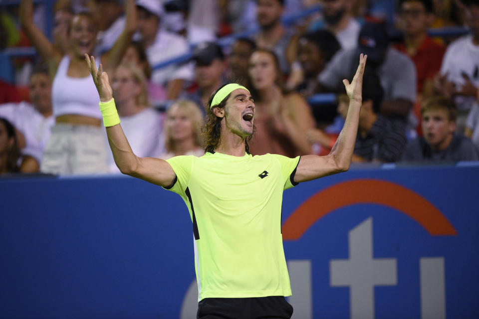 Lloyd Harris, of South Africa, reacts after he defeated Rafael Nadal, of Spain, at the Citi Open tennis tournament Thursday, Aug. 5, 2021, in Washington. Harris won 6-4, 1-6, 6-4. (AP Photo/Nick Wass)