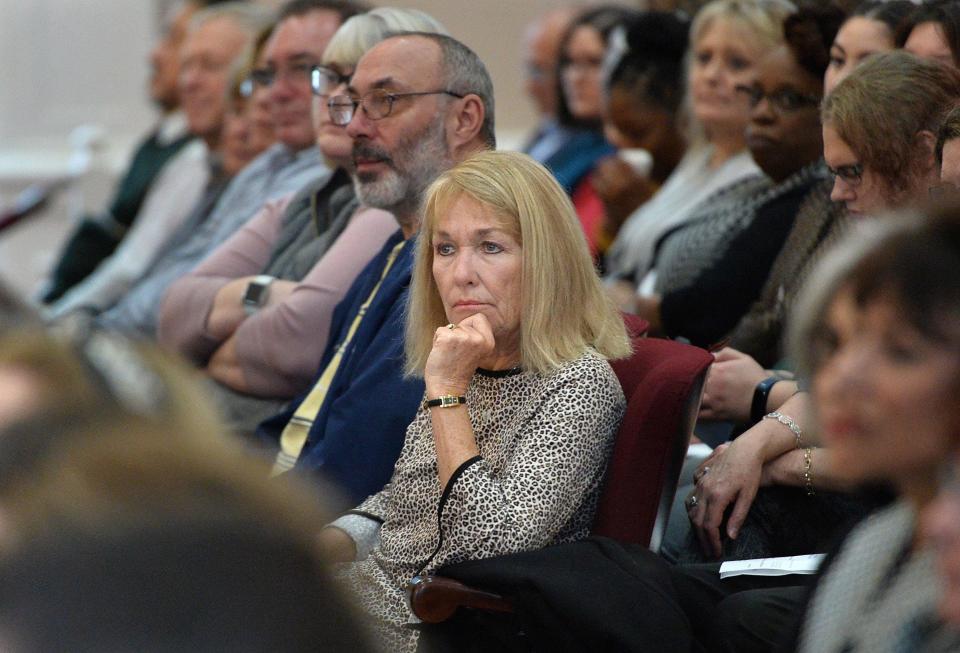 Former state Sen. Jane Earll, center, listens to speakers, Jan. 3, 2020, during a swearing-in ceremony for elected officials, including her husband, Erie County District Attorney Jack Daneri (not pictured), in Courtroom H at the Erie County Courthouse. [CHRISTOPHER MILLETTE/ERIE TIMES-NEWS]