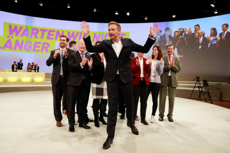 Leader of the Free Democrats (FDP) Christian Lindner (C), are hoping for a comeback as Merkel's junior coalition partner