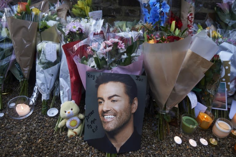 Tributes left outside the home of late British singer George Michael in north London