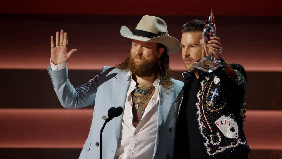 Brothers Osborne accept the award for Vocal Duo of the Year on Wednesday. - Seth Herald/Reuters
