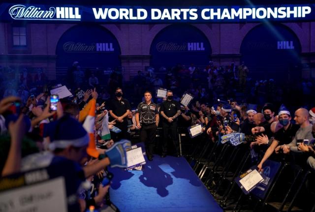 Gerwyn Price survives a scare to beat Edhouse in PDC world