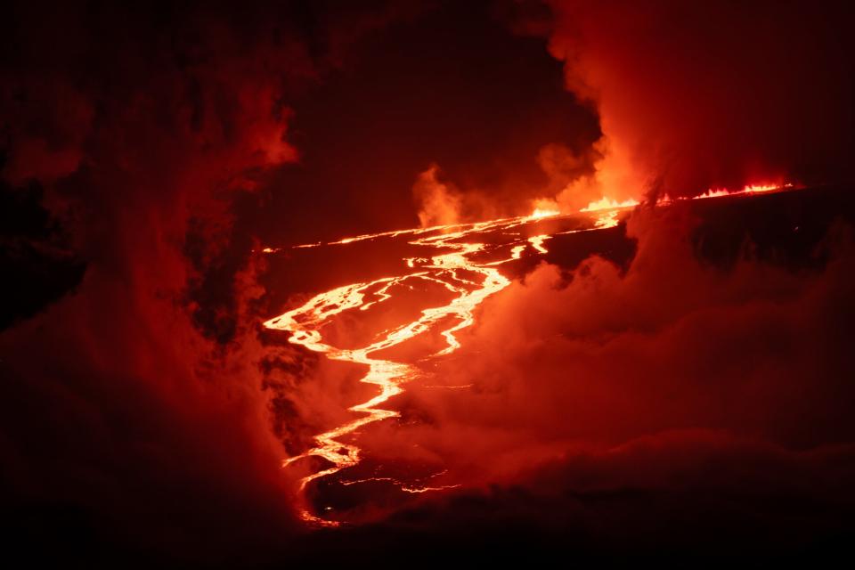 The Big Island's Mauna Loa Volcano erupts on November 28, 2022 on the Island of Hawaii. For the first time in almost 40 years, the biggest active volcano in the world erupted prompting an emergency response on the Big Island.