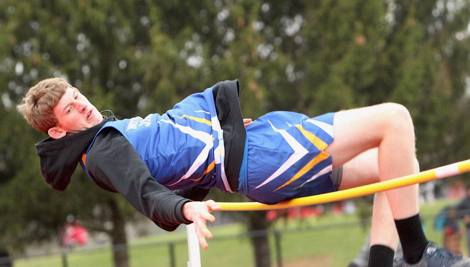 Mitchell freshman Nate Robertson competes in the high Jump during the meet earlier this season. He shifted to the discus for the Bedford North Lawrence Track & Field Sectional Thursday night and set a PR of 131-9.