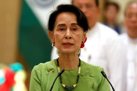 Myanmar State Counselor Aung San Suu Kyi talks during a news conference with India's Prime Minister Narendra Modi in Naypyitaw, Myanmar September 6, 2017. REUTERS/Soe Zeya Tun