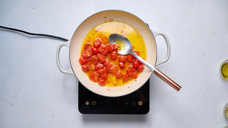 cooked tomatoes in skillet