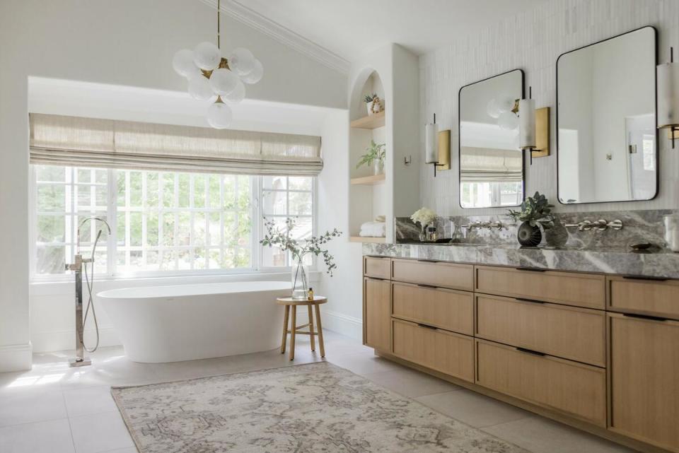 The designer transformed a dated primary bathroom into a soothing oasis