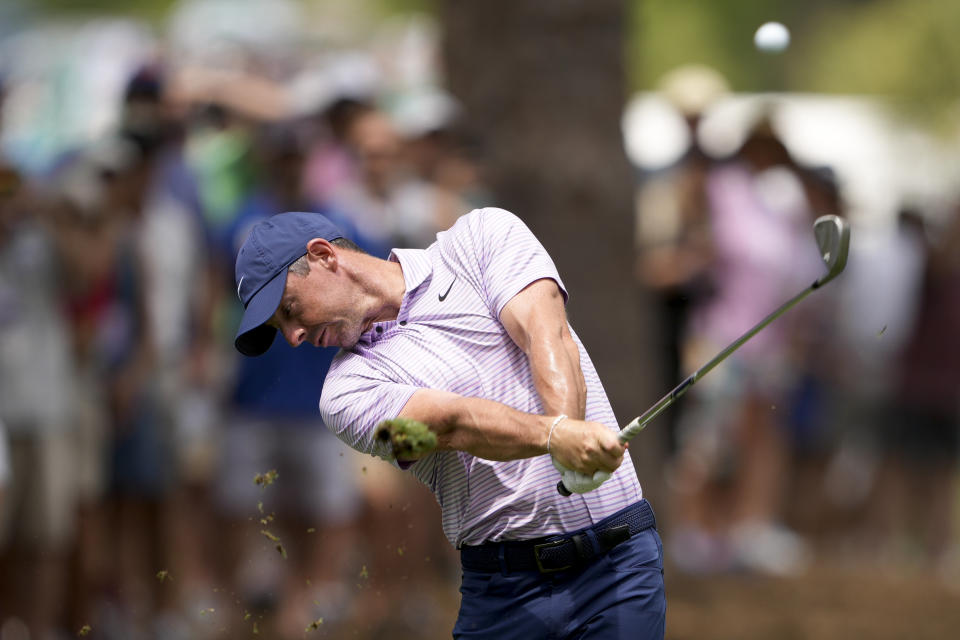 Rory McIlroy, of Northern Ireland, hits from the fairway on the first hole during the final round of the RBC Heritage golf tournament, Sunday, April 21, 2024, in Hilton Head Island, S.C. (AP Photo/Chris Carlson)