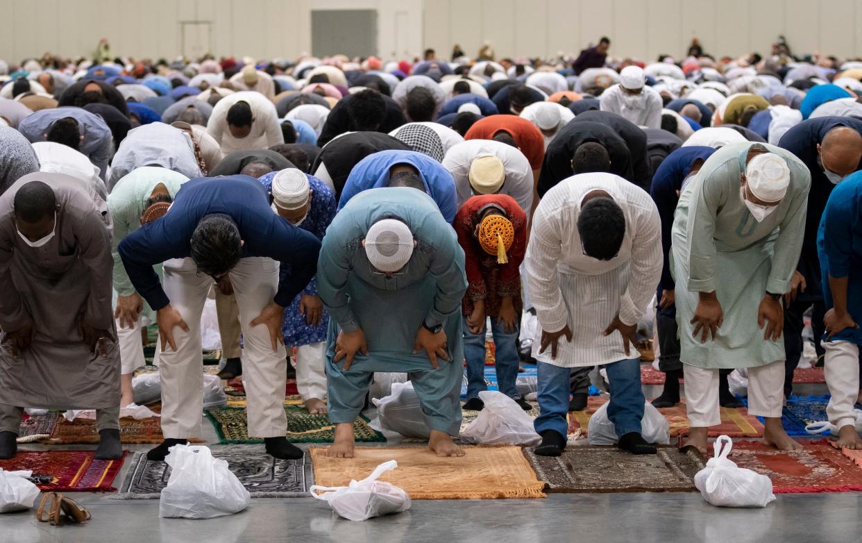 Muslims pray during the Noor Islamic Cultural Center's annual Eid al-Adha prayer at the Greater Columbus Convention Center on July 20, 2021