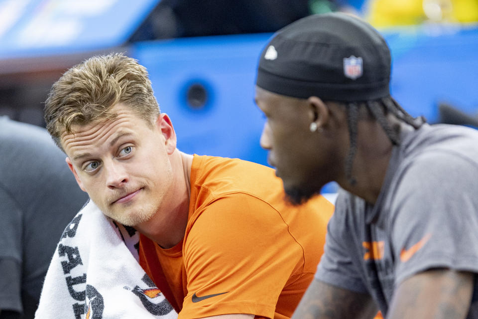 Will Joe Burrow, left, join Ja'Marr Chase on the field in Week 1? (Wesley Hitt/Getty Images)