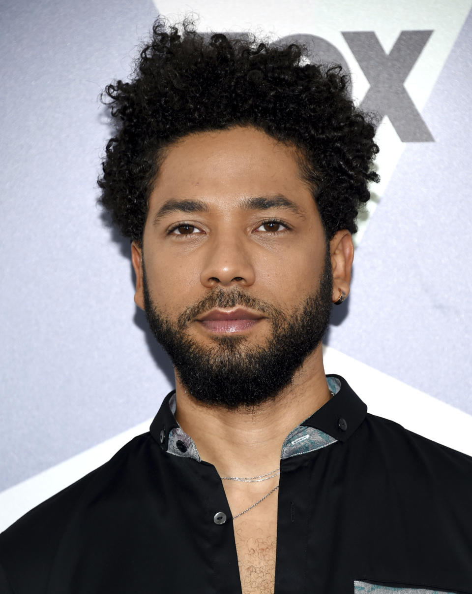 FILE - In this May 14, 2018 file photo, Jussie Smollett, a cast member in the TV series "Empire," attends the Fox Networks Group 2018 programming presentation afterparty in New York. A police official says "Empire" actor is now considered a suspect "for filing a false police report" and that detectives are presenting the case against him to a grand jury. Smollett told police he was attacked by two masked men while walking home from a Subway sandwich shop at around 2 a.m. on Jan. 29. He says they beat him, hurled racist and homophobic insults at him and looped a rope around his neck before fleeing. (Photo by Evan Agostini/Invision/AP, File)