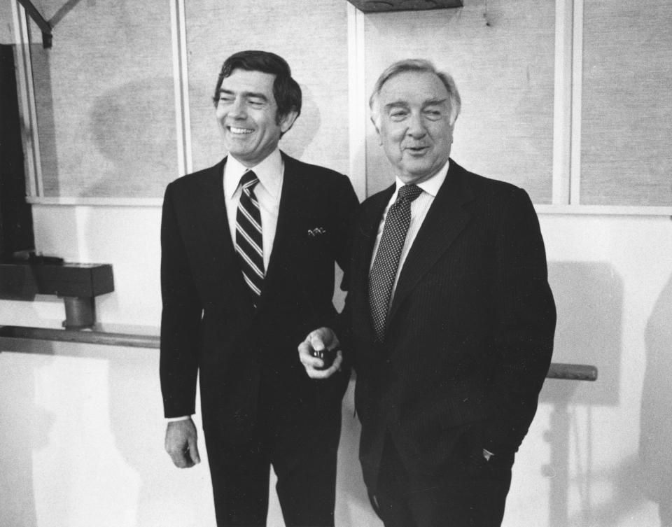 Walter Cronkite, right, and Dan Rather, left, are shown together prior to a news conference announcing that "60 Minutes" correspondent Rather is succeeding Cronkite as CBS News Managing Editor and news anchorman, in New York, on February 15, 1980.