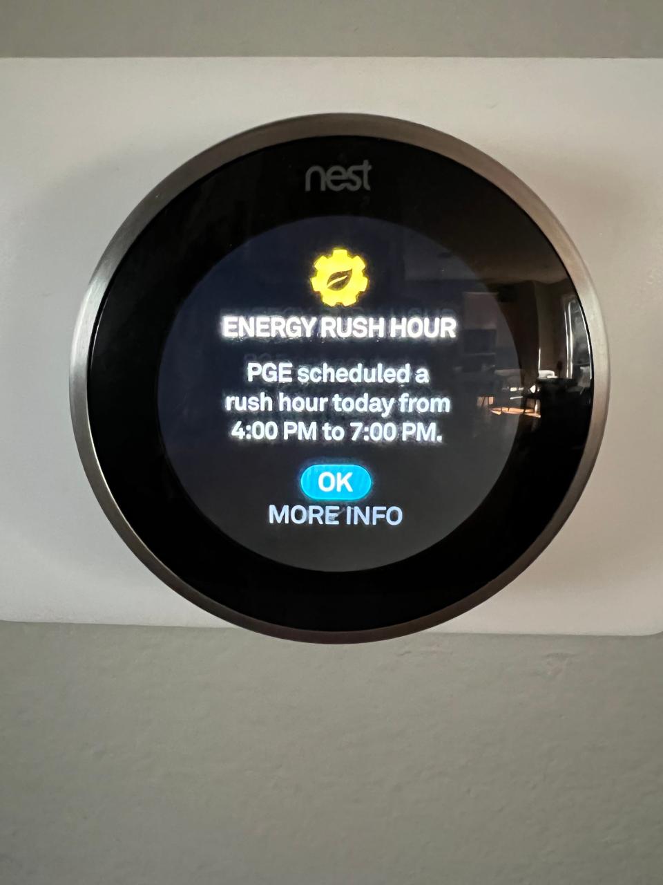 Michael Irving's Nest thermostat on Wednesday, July 27, 2022. Irving signed up with his utility, Portland General Electric, to voluntarily allow it to raise the temperature slightly during heat waves in exchange for a credit on his bills.