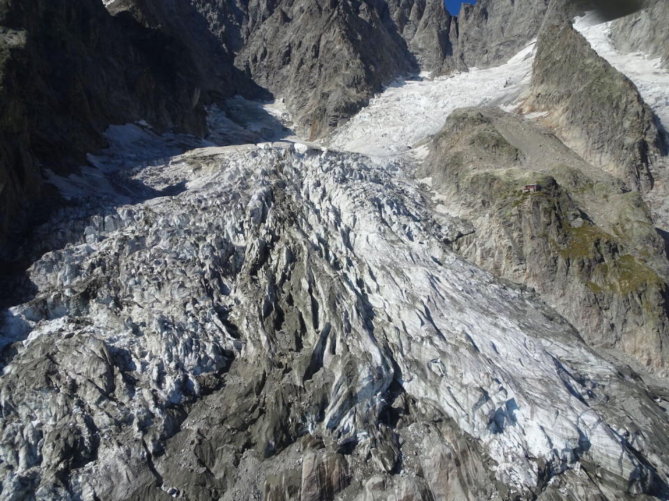 This photo taken on Friday, Sept. 20, 2019 shows the massive Planpincieux glacier, located in the Alps on the Grande Jorasses peak of the Mont Blanc massif, which straddles the borders of Italy, France and Switzerland and contains the highest peak in Western Europe. The fast-moving Italian glacier is melting quickly, threatening a picturesque valley near the Alpine town of Courmayeur and prompting the mayor to close down a mountain road. Mayor Stefano Miserocchi has forbidden access to a section of the Val Ferret, outside of Courmayeur, a popular hiking area on the south side of the Mont Blanc massif. (Comune di Courmayeur, Fondazione Montagna Sicura via AP)
