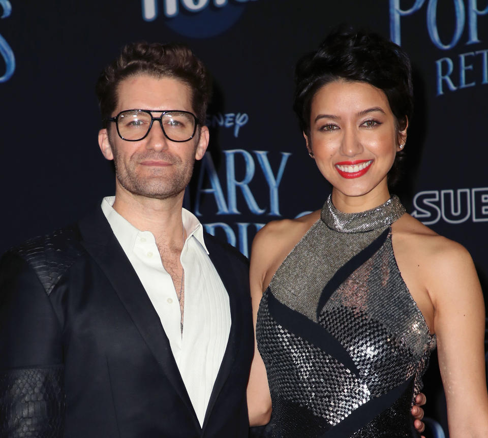 Matthew and Renee smiling on the red carpet