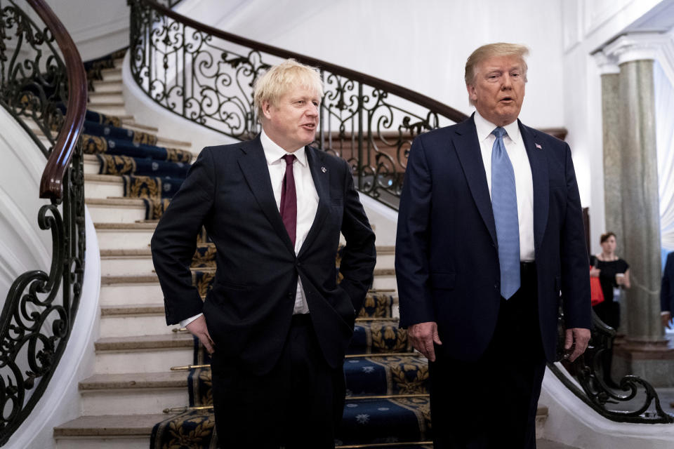 President Donald Trump and Britain's Prime Minister Boris Johnson, left, speak to the media before a working breakfast meeting at the Hotel du Palais on the sidelines of the G-7 summit in Biarritz, France, Sunday, Aug. 25, 2019. Boris Johnson and Donald Trump have quite a bit in common as two populist iconoclasts in hot water after leaving the top office in their respective nations. But they are likely on different trajectories. Trump is the frontrunner for his party's presidential nomination and stands a solid chance of winning back his old job from President Joe Biden in 2024. Johnson is a man without a party with a less direct route back to power in the United Kingdom. (Erin Schaff, The New York Times, Pool, File)