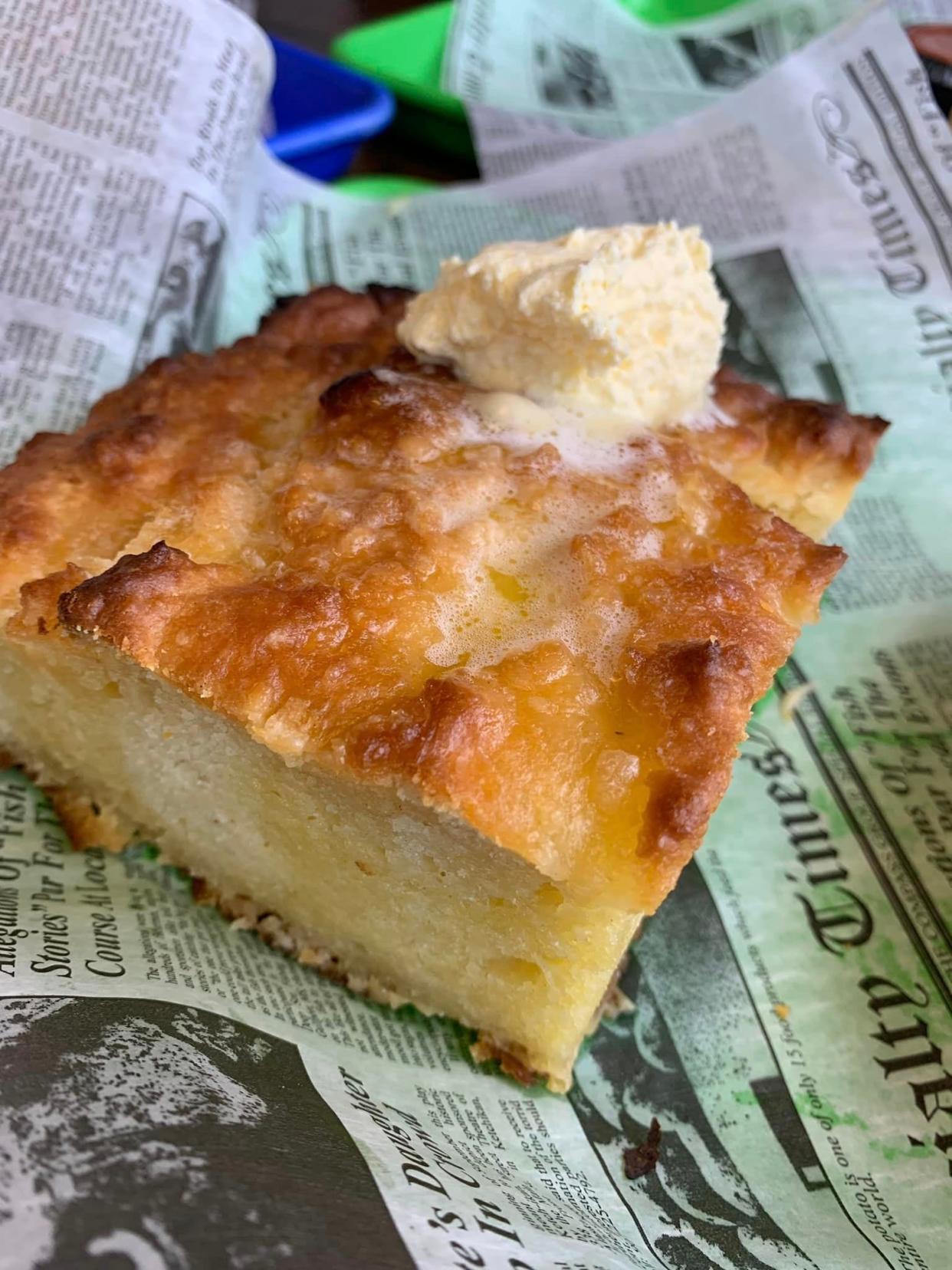 Biscuit bread at Big Daddy J's 5 Great Things Watering Station and Restaurant in Cocoa Beach comes topped with a generous scoop of butter.