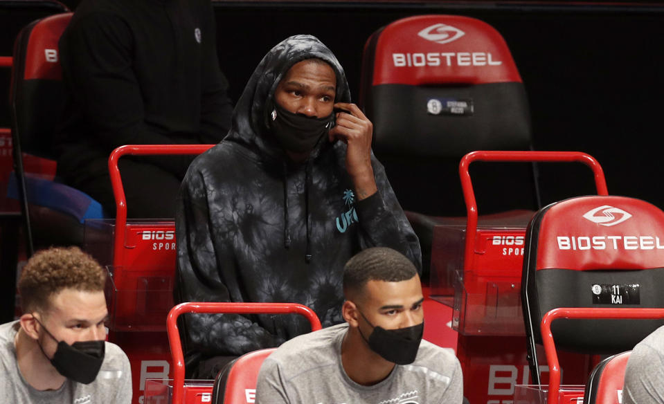 NEW YORK, NEW YORK - MARCH 21: (NEW YORK DAILIES OUT)  Kevin Durant #7 of the Brooklyn Nets looks on against the Washington Wizards at Barclays Center on March 21, 2021 in New York City. The Nets defeated the Wizards 113-106. NOTE TO USER: User expressly acknowledges and agrees that, by downloading and or using this photograph, User is consenting to the terms and conditions of the Getty Images License Agreement. (Photo by Jim McIsaac/Getty Images)