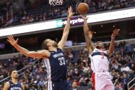 Dec 13, 2017; Washington, DC, USA; Washington Wizards guard Bradley Beal (3) shoots the ball as Memphis Grizzlies center Marc Gasol (33) defends in the third quarter at Capital One Arena. The Wizards won 93-87. Geoff Burke-USA TODAY Sports