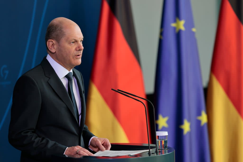 Olaf Scholz has been accused of acting like a ‘sulky liver sausage’  (AP)