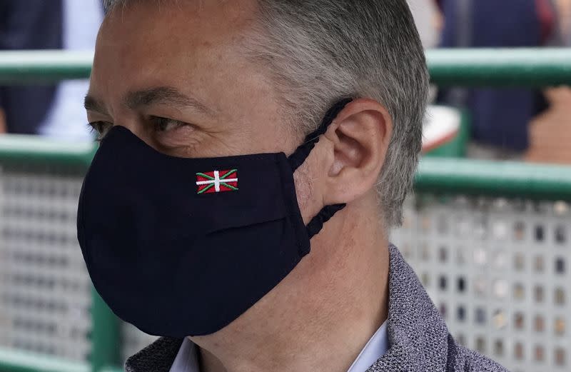 Basque premier Inigo Urkullu leaves a polling station after voting during the Basque regional elections, amid the coronavirus disease (COVID-19) outbreak, in Durango