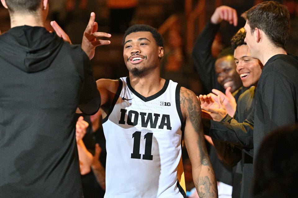 Oct 30, 2023; Iowa City, IA, USA; Iowa Hawkeyes guard Tony Perkins (11) is introduced before the game against the Quincy University Hawks at Carver Hawkeye Arena. Mandatory Credit: Jeffrey Becker-USA TODAY Sports