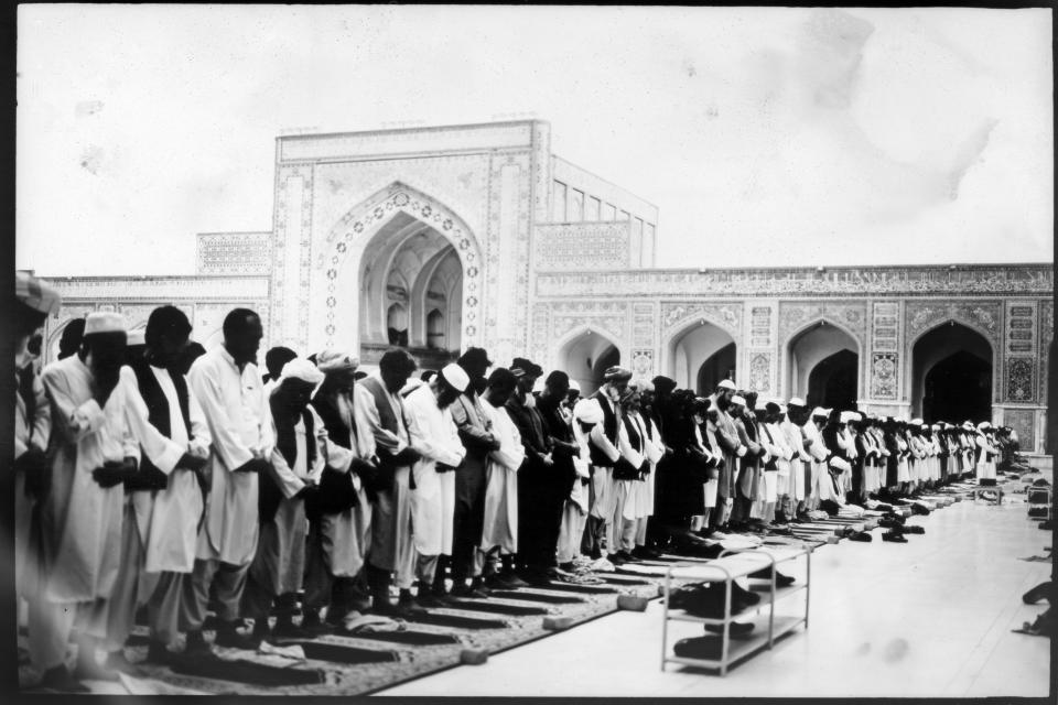 Worshippers pray inside the Jama Masjid mosque, also known as Great Mosque, in Herat, Afghanistan, Thursday, June 1, 2023. (AP Photo/Rodrigo Abd)