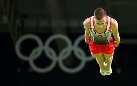 2016 Rio Olympics - Trampoline Gymnastics - Preliminary - Men's Qualification - Rio Olympic Arena - Rio de Janeiro, Brazil - 13/08/2016. Uladzislau Hancharou (BLR) of Belarus competes. REUTERS/Mike Blake