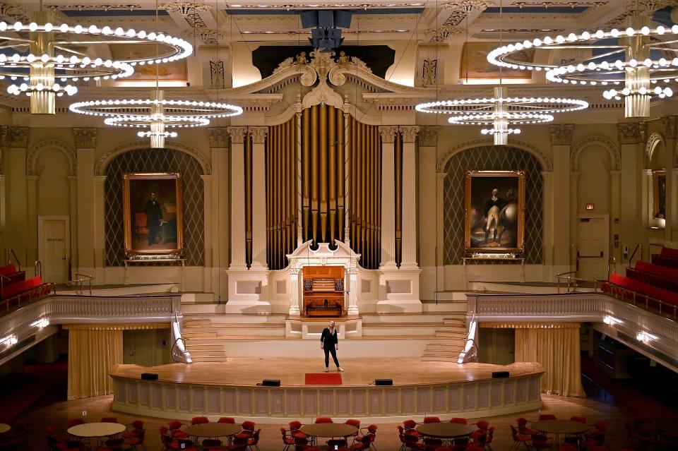 Sarah Barnacle tests out the acoustics in the Great Hall.