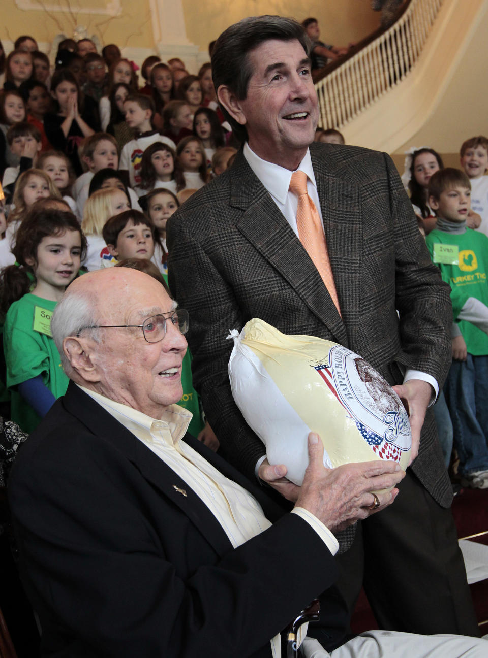 Alabama turkey producer Bill Bates, left, presents Gov. Bob Riley with a Thanksgiving turkey after the governor pardoned Clyde the Thanksgiving turkey during ceremonies at the governor’s mansion in Montgomery, Ala., Tuesday, Nov. 16, 2010. Riley allowed a group of children to determine Clyde’s fate, and he was pardoned for the 61st straight year.