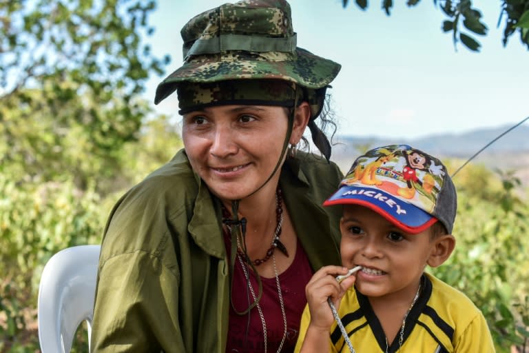 At camps where FARC are disarming under a peace deal guerrillas in combats play with children as a baby boom hit FARC after peace talks with Colombian government opened in 2012