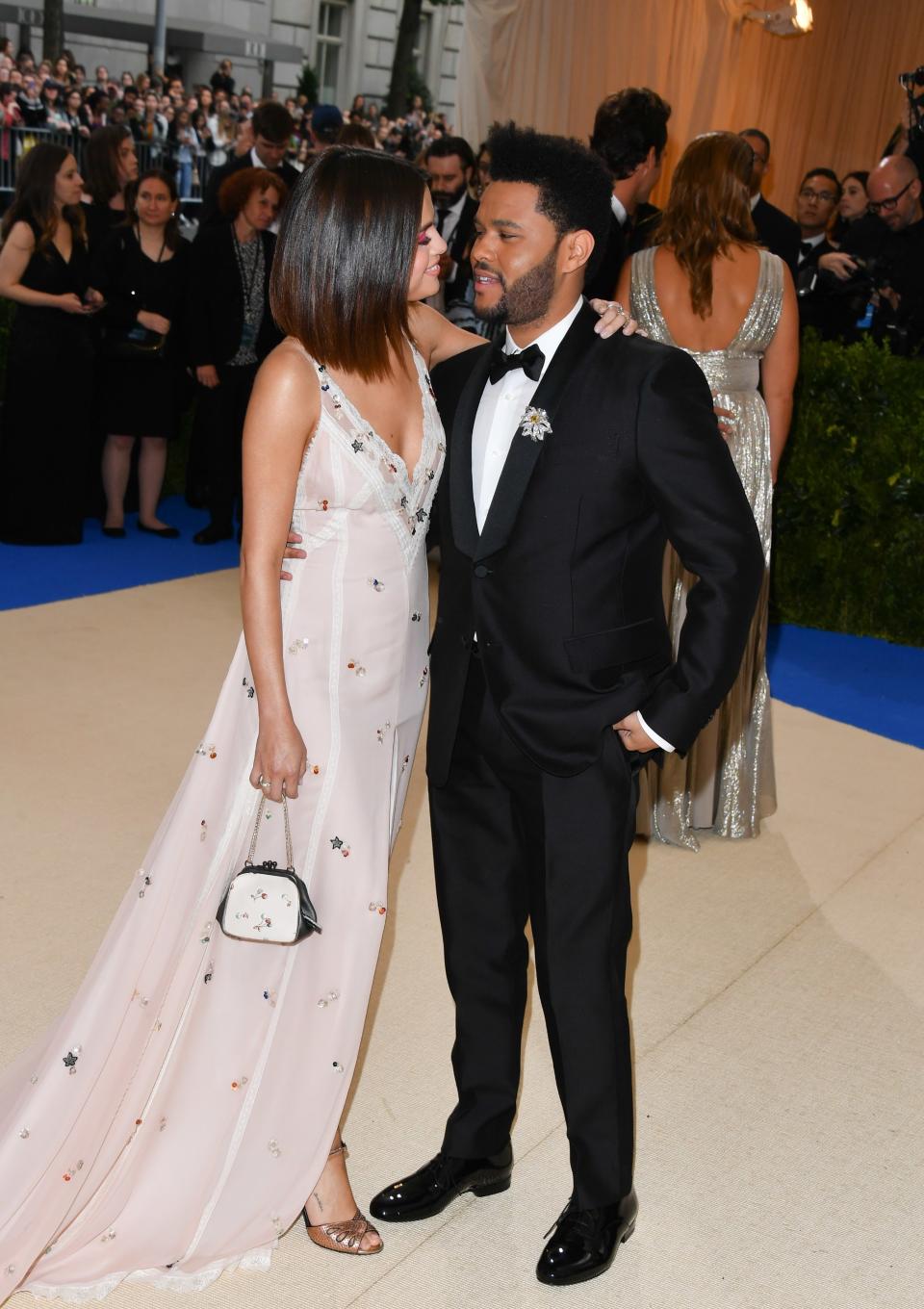 Selena Gomez and The Weekend made their relationship official at the 2017 Met Gala, posing for several adorable couple photos.