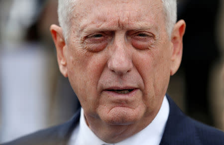 FILE PHOTO: Secretary of Defense Jim Mattis speaks with the media before an enhanced honor cordon arrival of Greek Minister of Defense Panagiotis Kammenos at the Pentagon in Washington, U.S., October 9, 2018. REUTERS/Joshua Roberts/File Photo